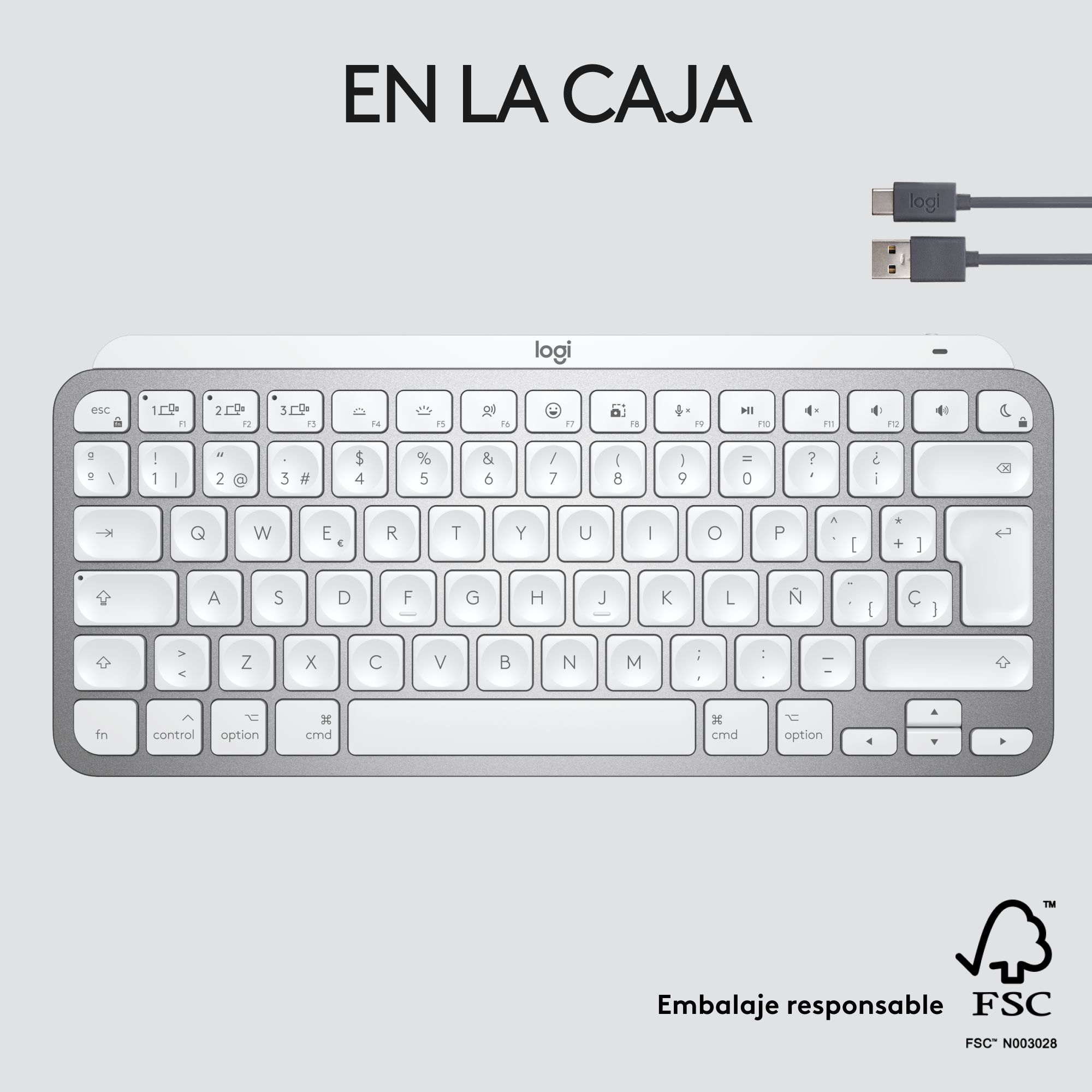 Un teclado Logitech plateado con teclas blancas, un cable USB-C y el texto 'EN LA CAJA'.