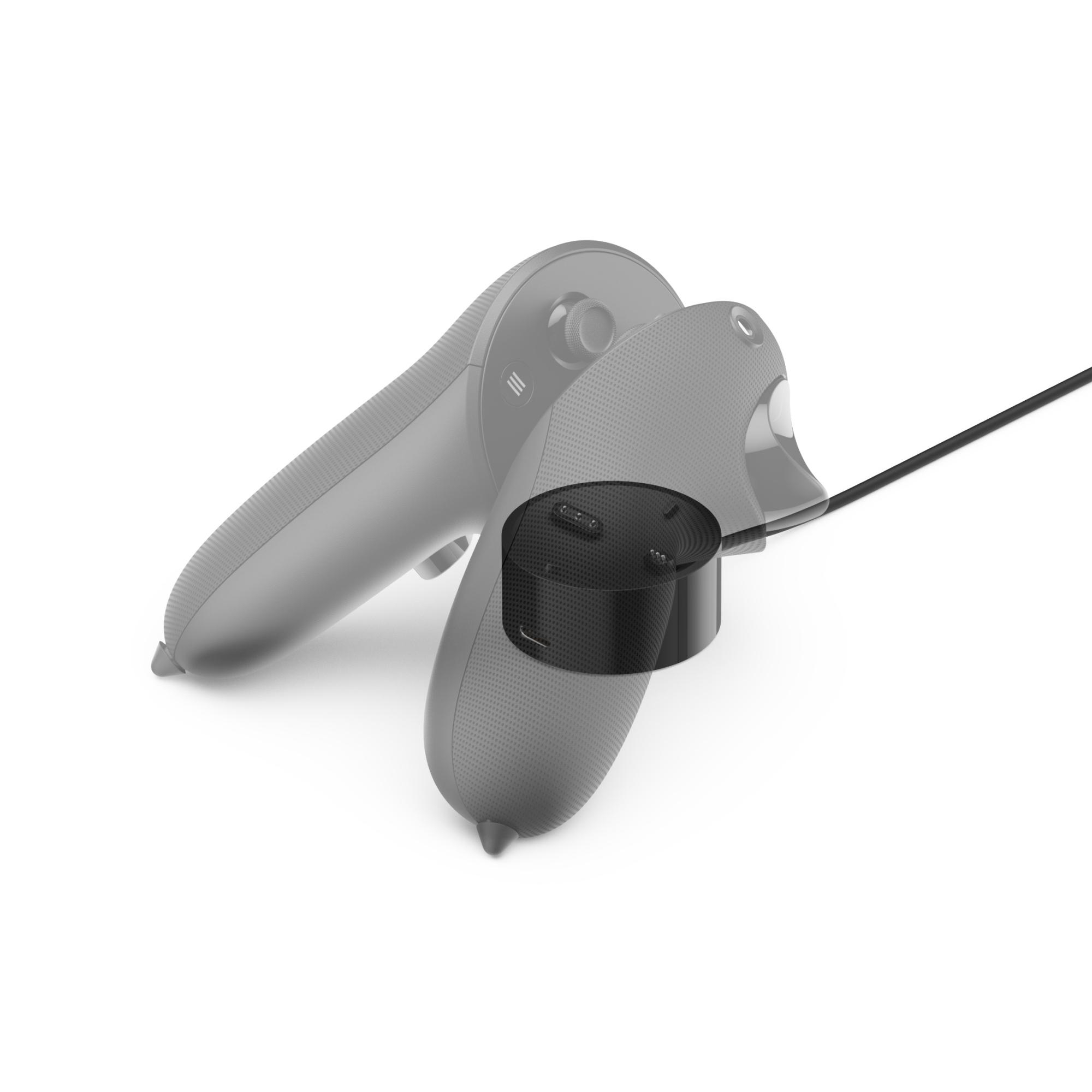 VR-Controller mit Ladestation, alles auf weißem Hintergrund.