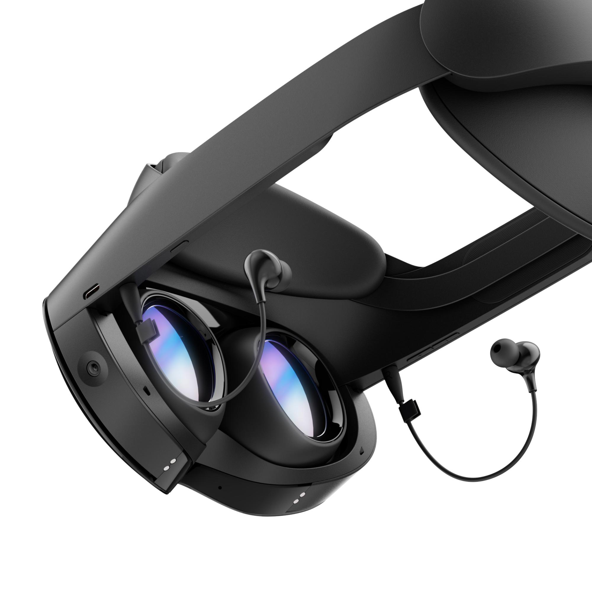 VR-Headset, schwarz, mit Linsen und angeschlossenen Kopfhörern.