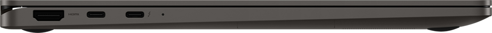 Close-up van de zijkant van een donkergrijze laptop. HDMI, USB-C en andere poorten zichtbaar.