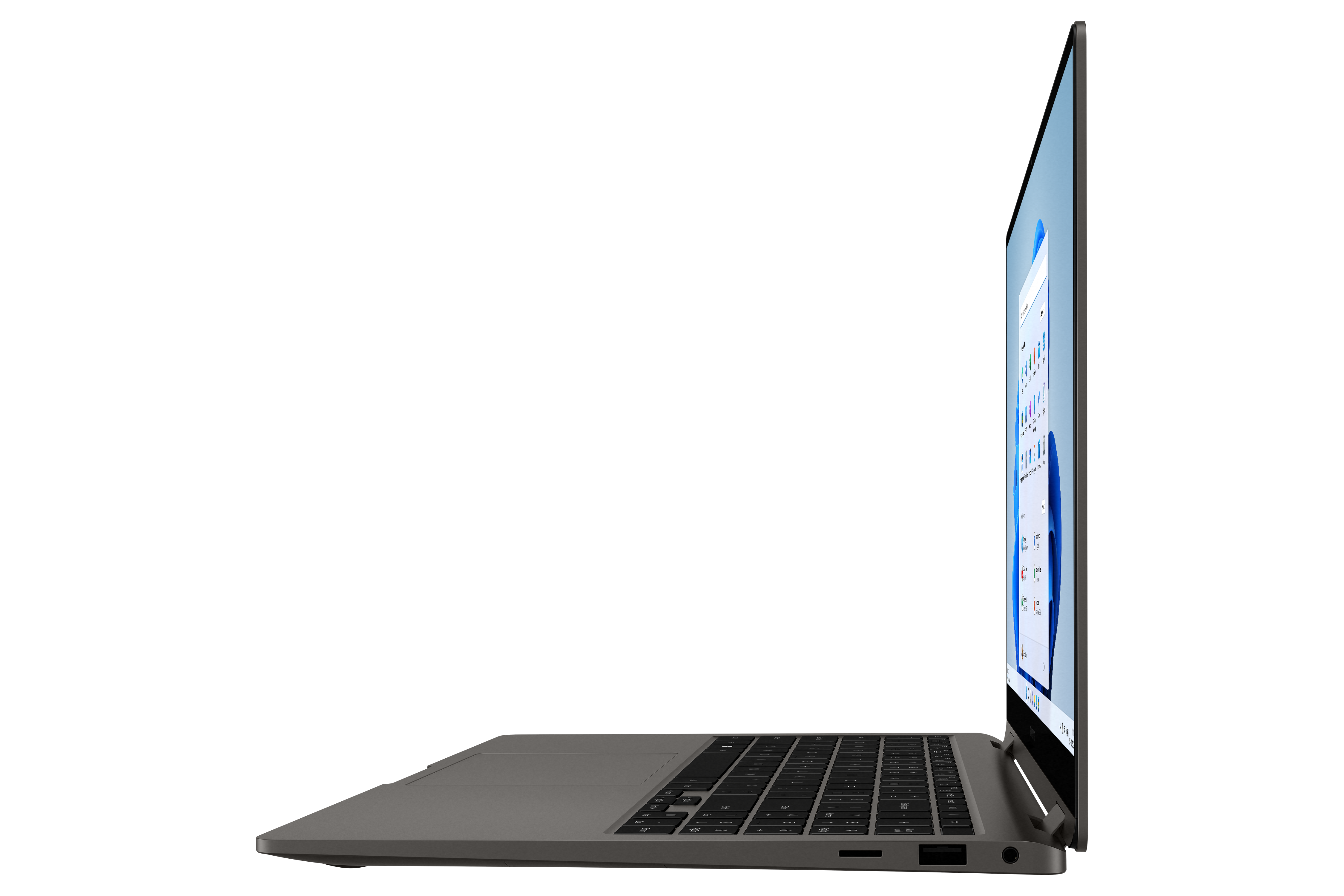 Laptop profile view, gray color, black keyboard, with the screen showing white and blue graphics.