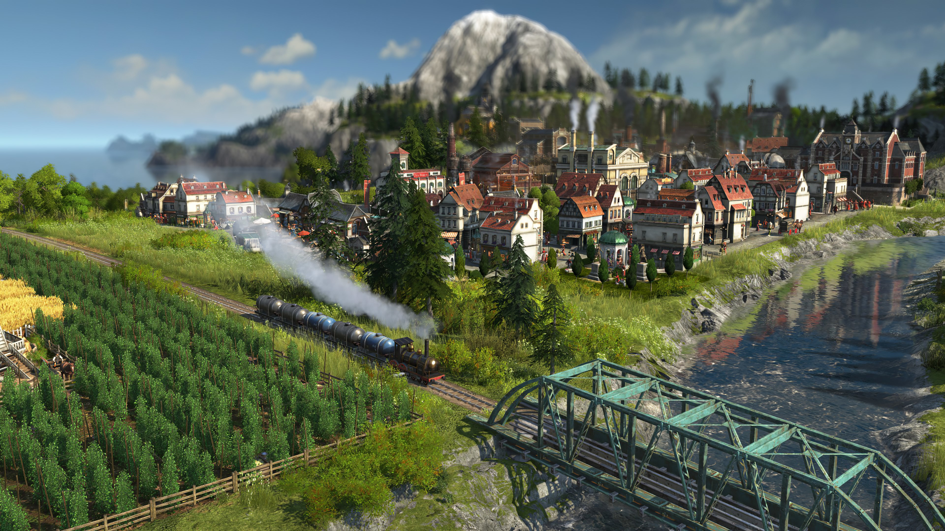 Un paysage détaillé d'une ville avec des voies ferrées, un train et une rivière. Champs verts et montagnes.