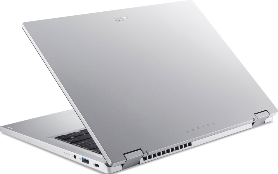 Un laptop argentato, aperto, angolato, con il logo Acer visibile. Sfondo nero.