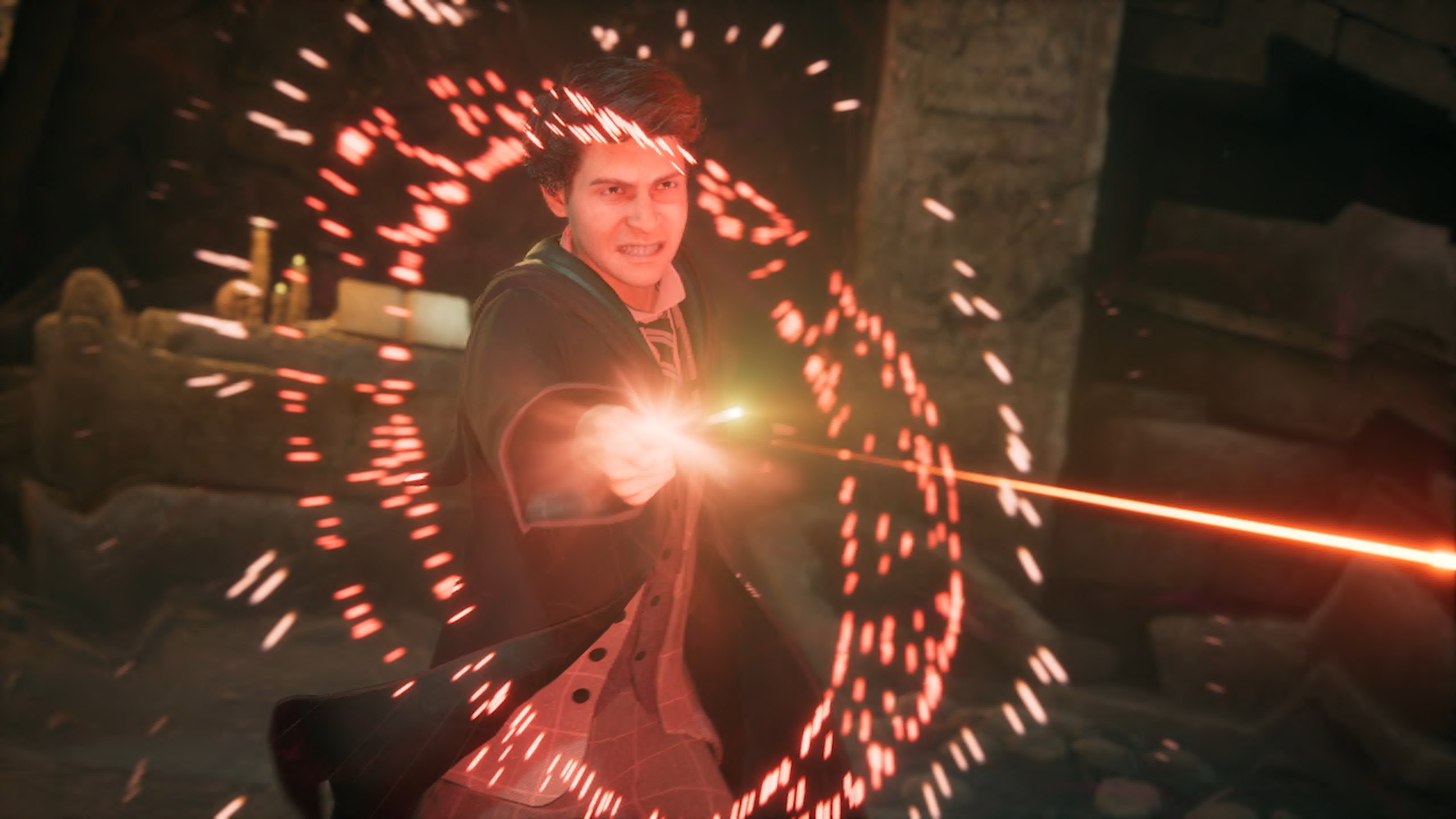 Un hombre con una túnica de Hogwarts lanzando un hechizo. Energía roja lo rodea. Efecto mágico visible.