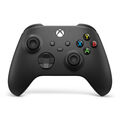 Mando Xbox negro con botones y joysticks. Logotipo de Xbox arriba.
