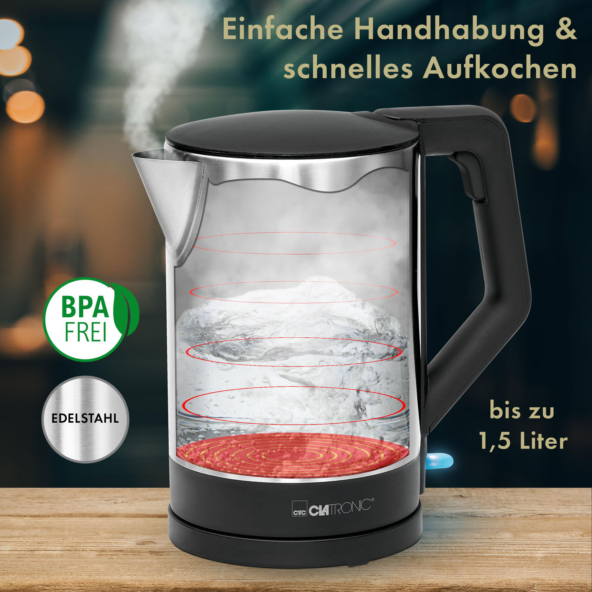 Ein schwarzer und gläserner Wasserkocher mit Dampf und rotem Heizelement.