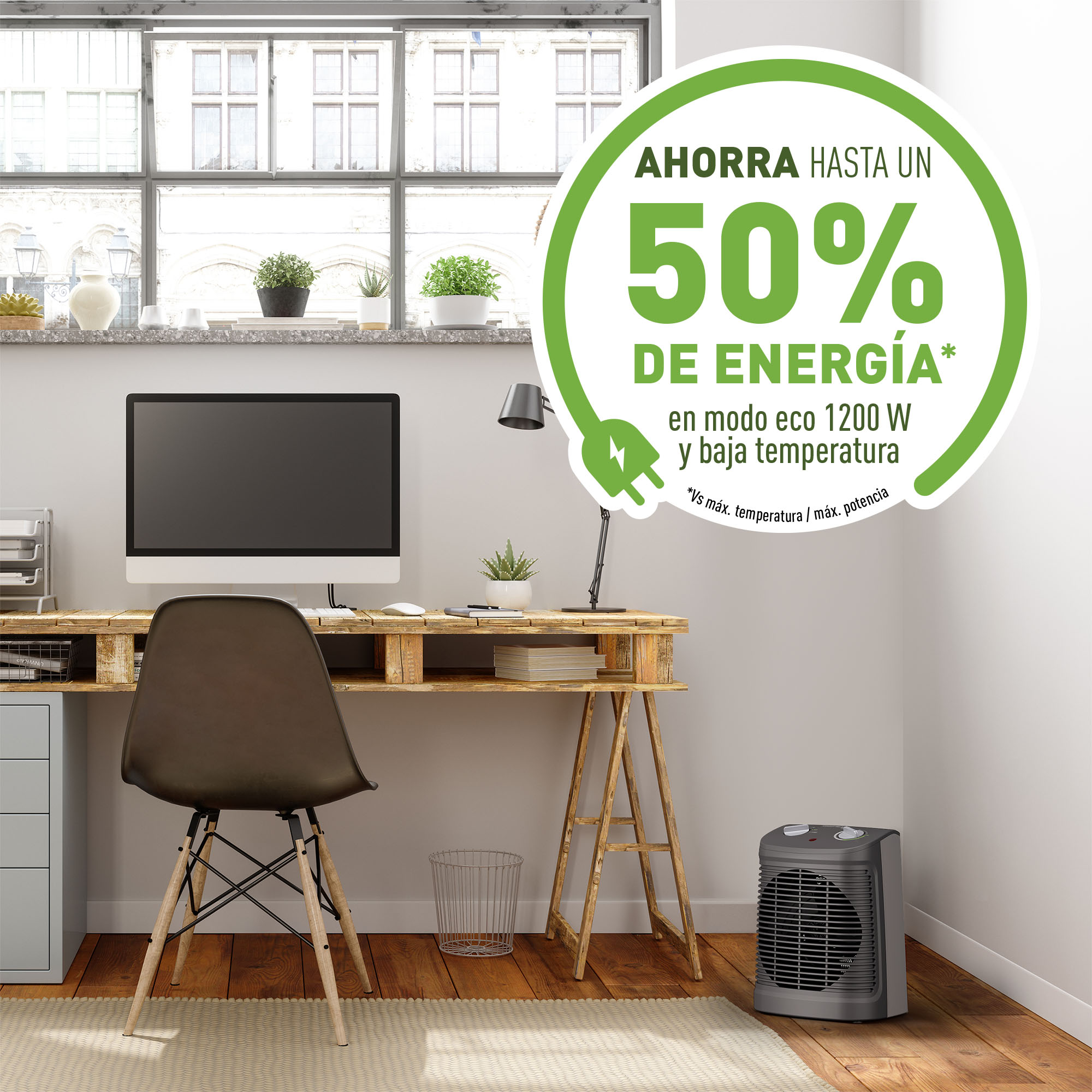 Oficina con escritorio, silla, monitor y calefactor. Un letrero verde indica ahorro de energía de hasta el 50%.