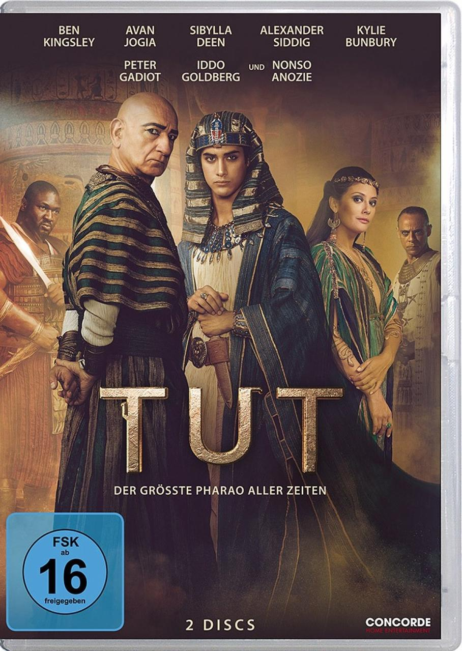 DVD-Cover für 'TUT' mit Schauspielern. Ben Kingsley links. Titel ist in Gold.