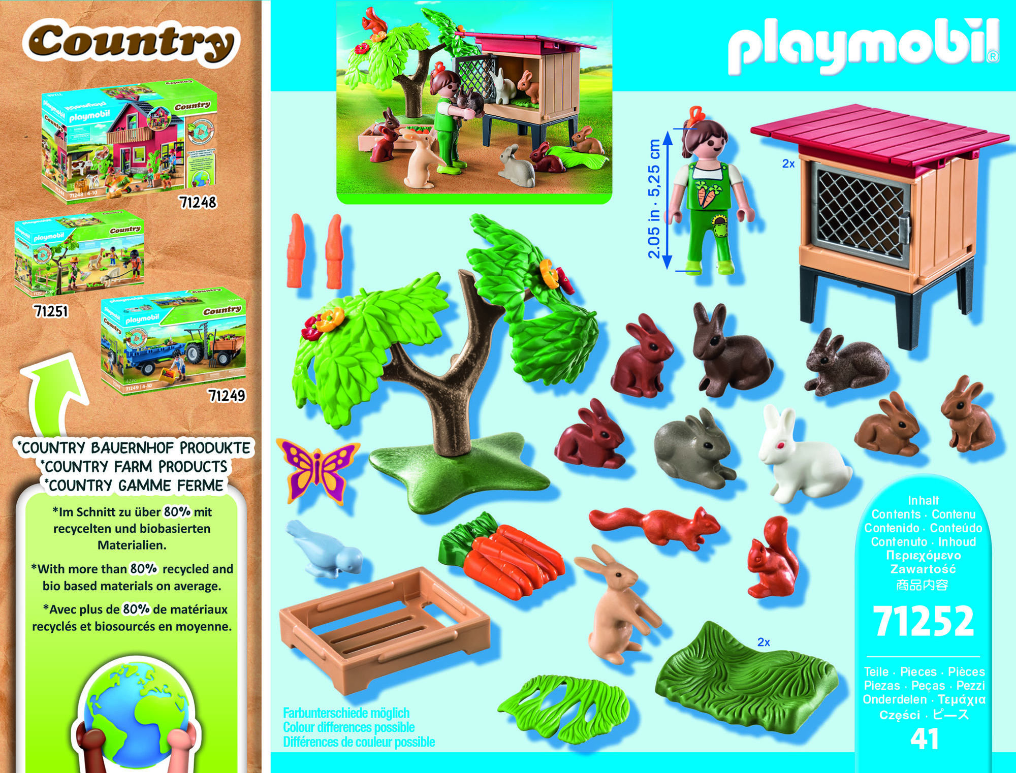 Ein Playmobil Country-Set mit Kaninchenstall, Kaninchen, einer Mädchenfigur, Karotten, einem Baum und anderem Zubehör.