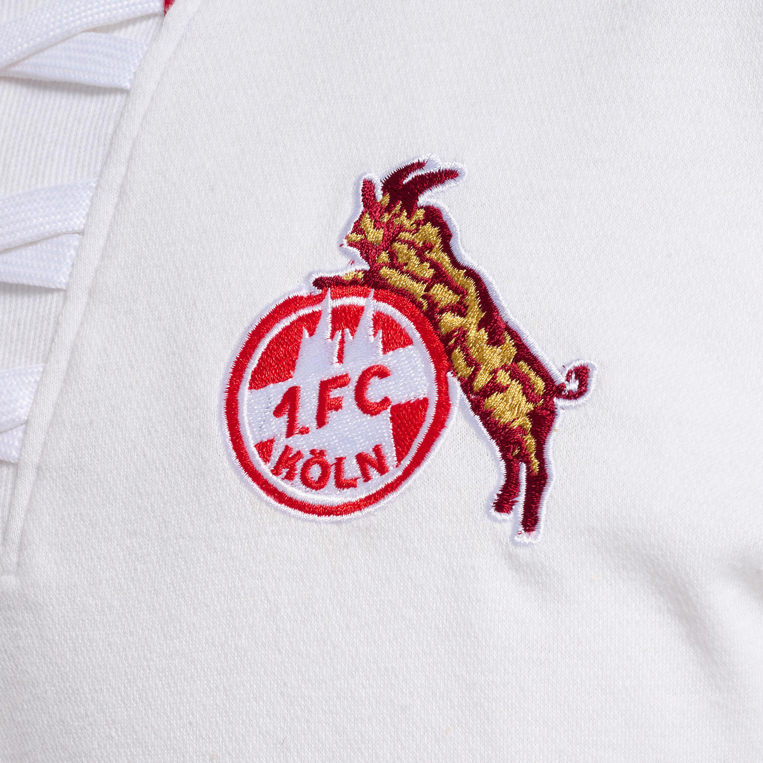 Logo von 1. FC Köln, mit einer Ziege und einem runden Emblem in Rot und Weiß.