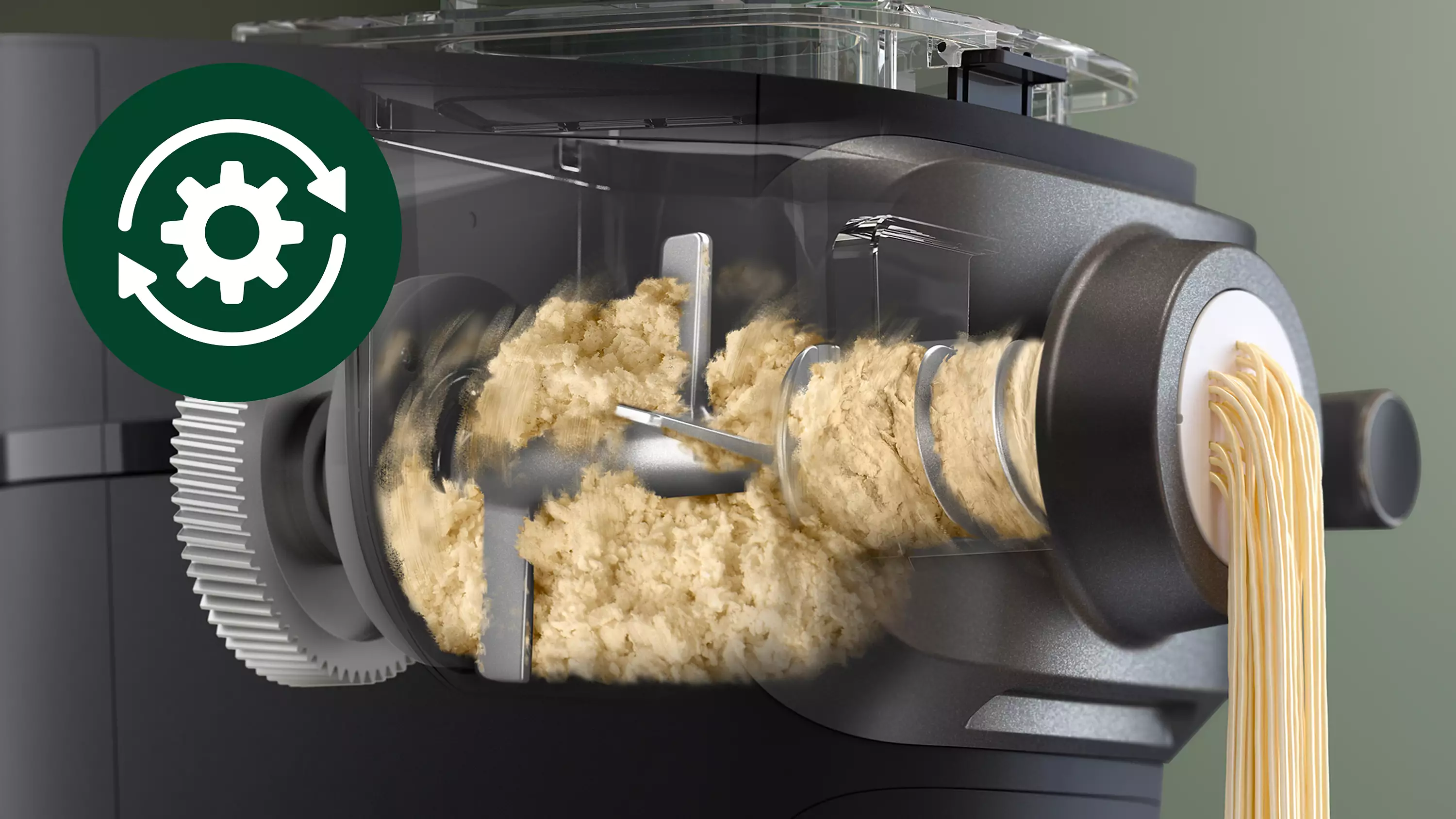Machine à pâtes en action, montrant le processus de fabrication des pâtes avec une vue dégagée.