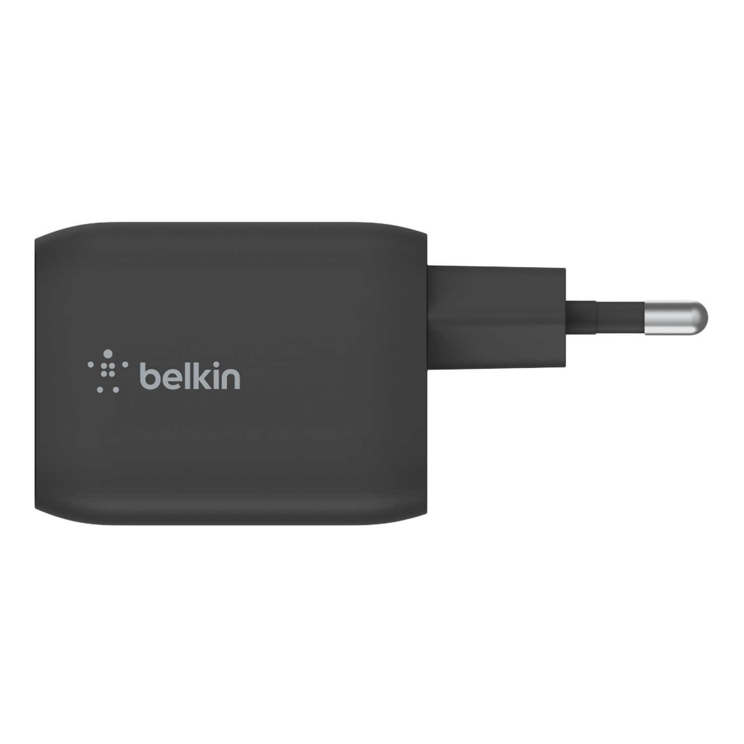 Black Belkin power adapter with a plug, isolated on a black background.