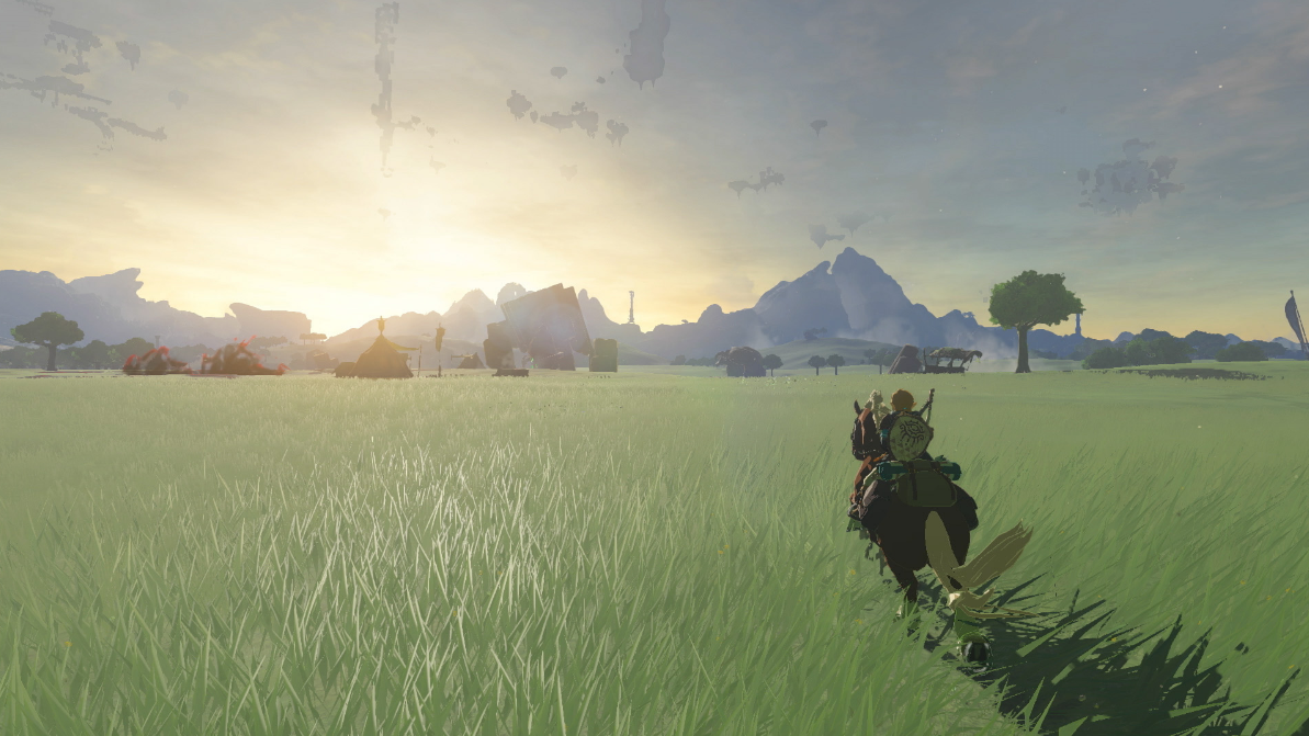 Spielszene: Zwei Charaktere auf Pferden in einem Feld, Berge und Sonnenuntergang im Hintergrund.