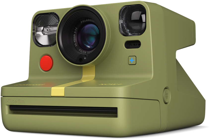 Grüne und gelbe Polaroid-Kamera mit rotem Knopf, schwarzem Objektiv.