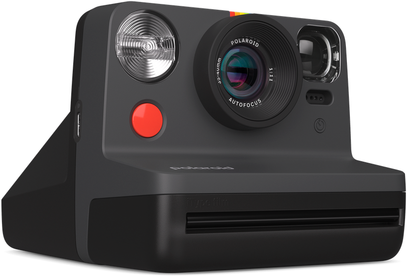 Schwarze Polaroid Kamera mit rotem Knopf, Blitz und Objektiv. Regenbogenstreifen oben.
