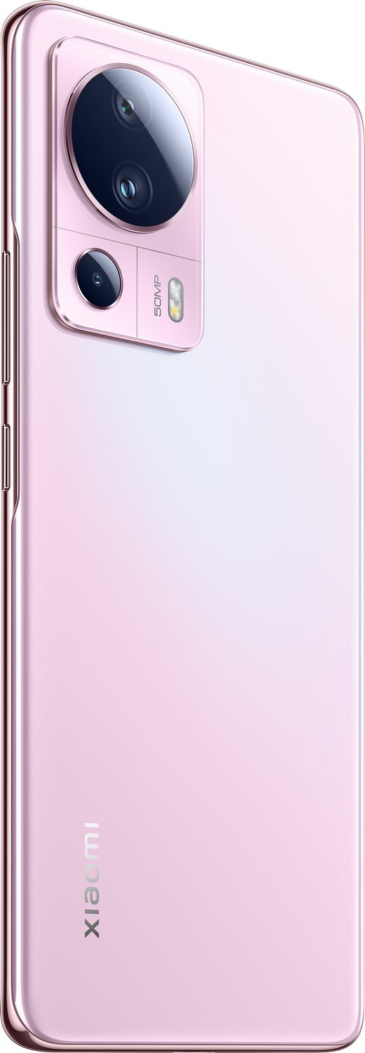 Un teléfono inteligente rosa con un módulo de cámara se muestra de lado.