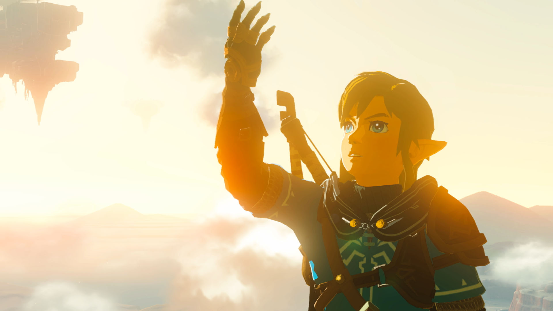 Link, un personaje de un juego, levanta la mano en un paisaje soleado.