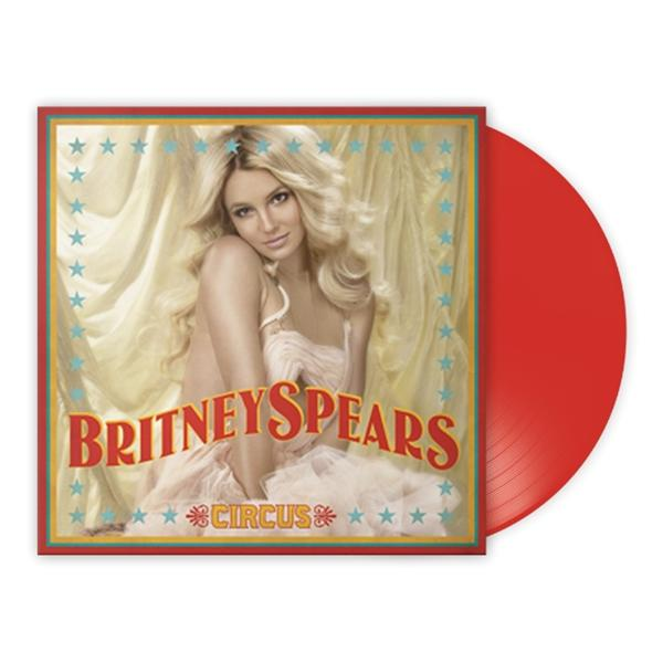 Britney Spears album borítója piros vinyllel. Fehér ruhát visel. A címe: 'Circus'.