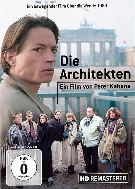 Die Architekten Filmcover mit Personen und einem Mann im Vordergrund.