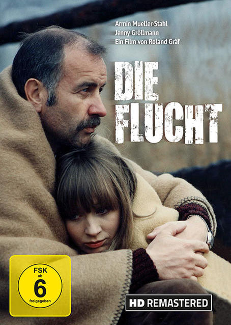 DVD-Cover für Die Flucht. Ein Mann und eine Frau umarmen sich. Text und Bewertung sind auf dem Cover abgebildet.