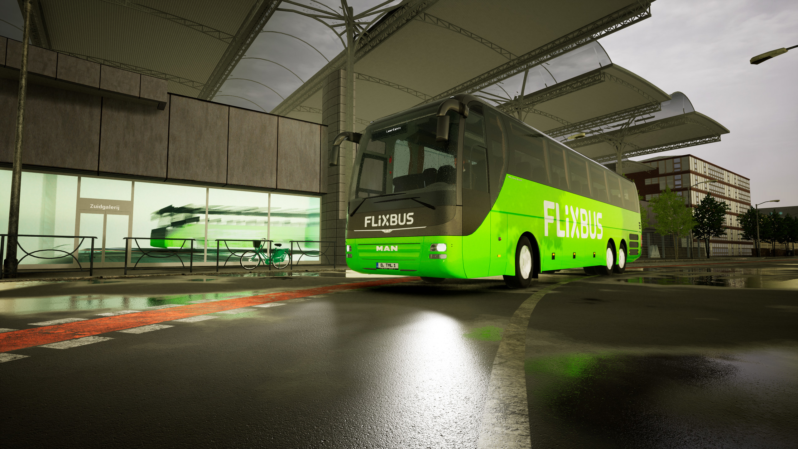 Bus Flixbus vert garé à une gare. Un vélo est à gauche.