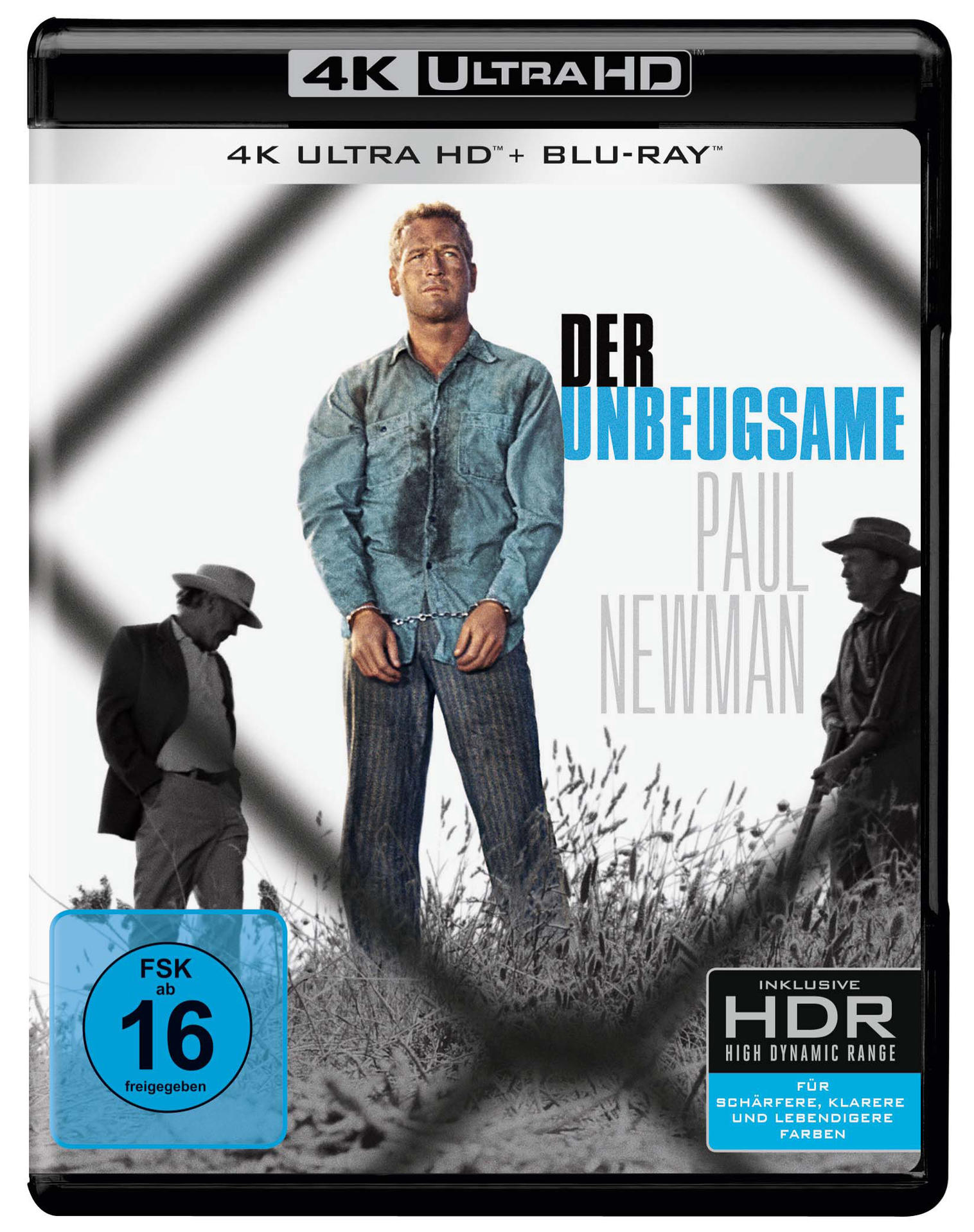 DVD-Cover von 'Der Unbeugsame'. Paul Newman in Ketten, Zaun im Hintergrund.