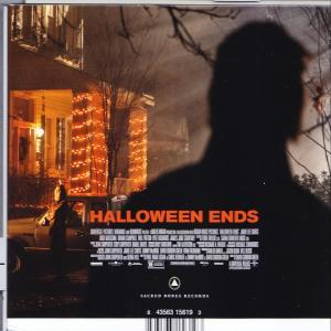 Halloween Ends Filmcover mit Text und einer Schattenfigur vor einem Haus.
