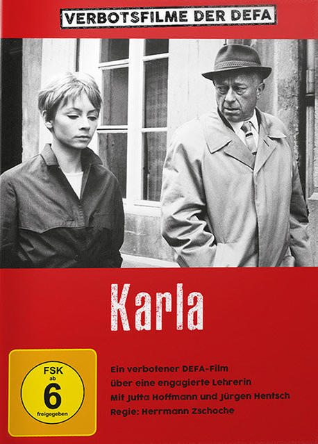DVD-Cover: zwei Personen, Text auf Deutsch. Roter Hintergrund. Schwarz-Weiß-Foto.