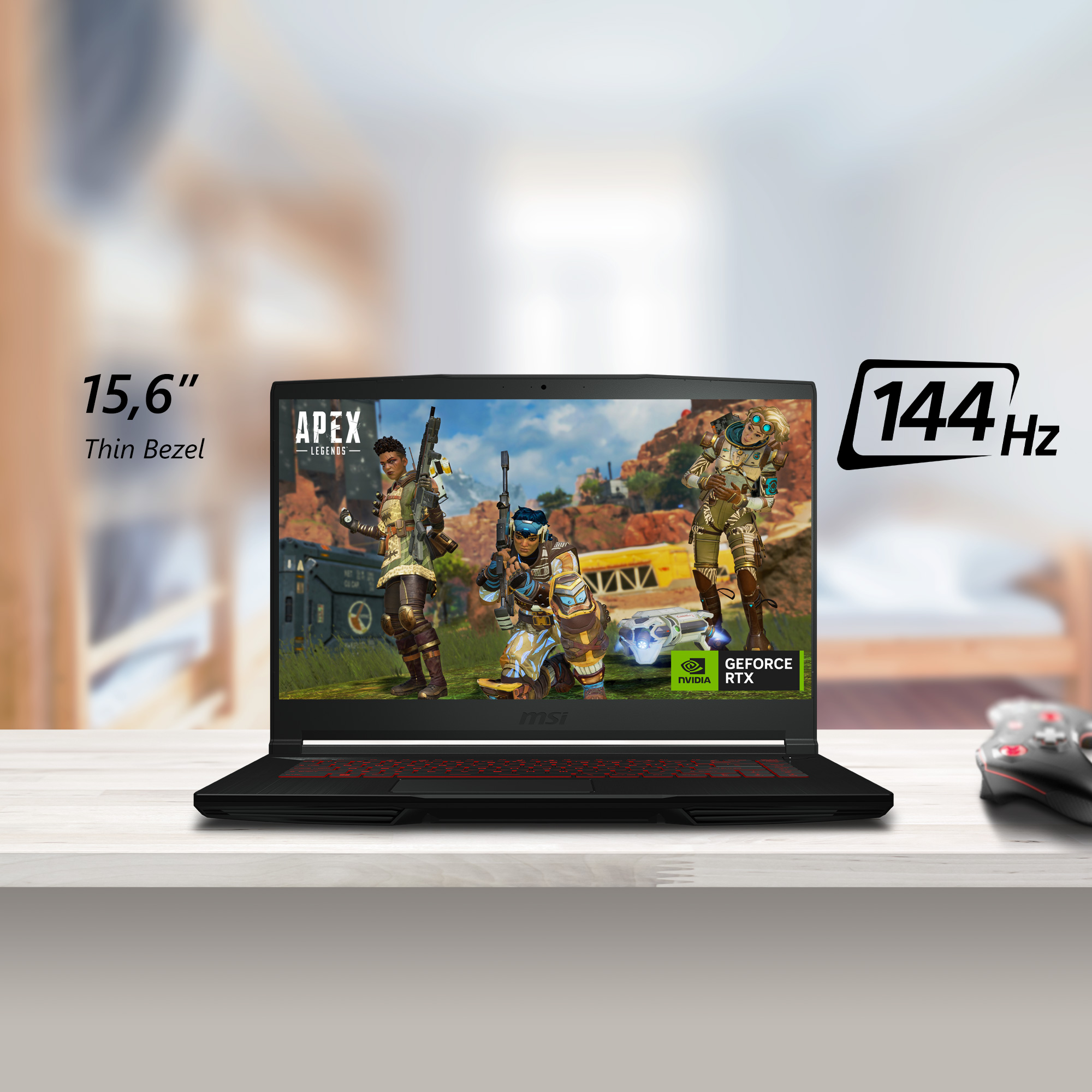 Ein schwarzer Laptop mit einem Spiel auf dem Bildschirm. Auf einem Tisch.