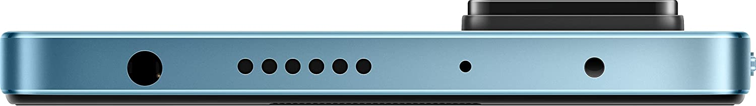 Redmi telefonun alt kısmı, hoparlör, mikrofon ve şarj portu ile.
