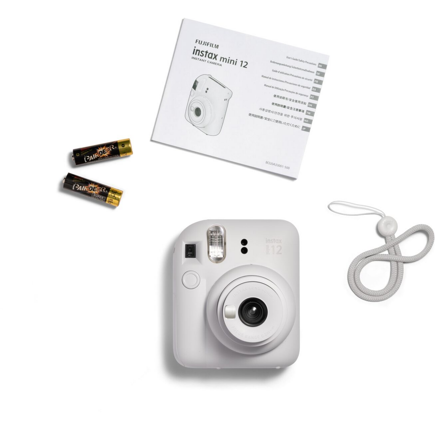 Witte Instax Mini 12 camera met accessoires. Inclusief batterijen, handleiding en riem.