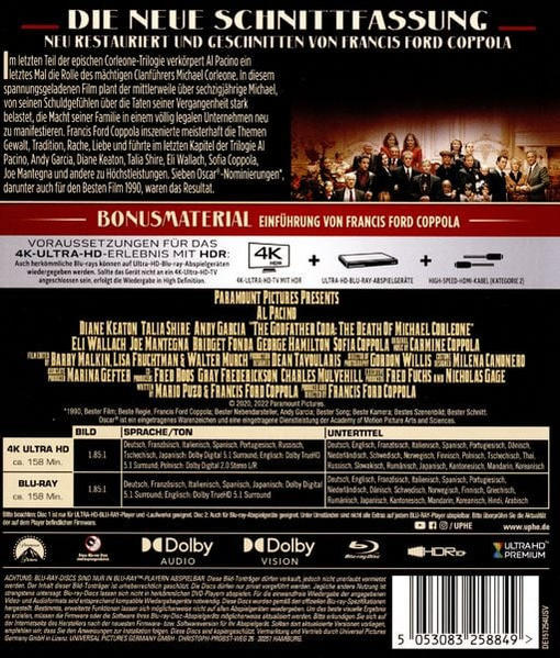 Rückseite einer DVD-Hülle. Text auf Deutsch. Fotos einer Personengruppe werden gezeigt.