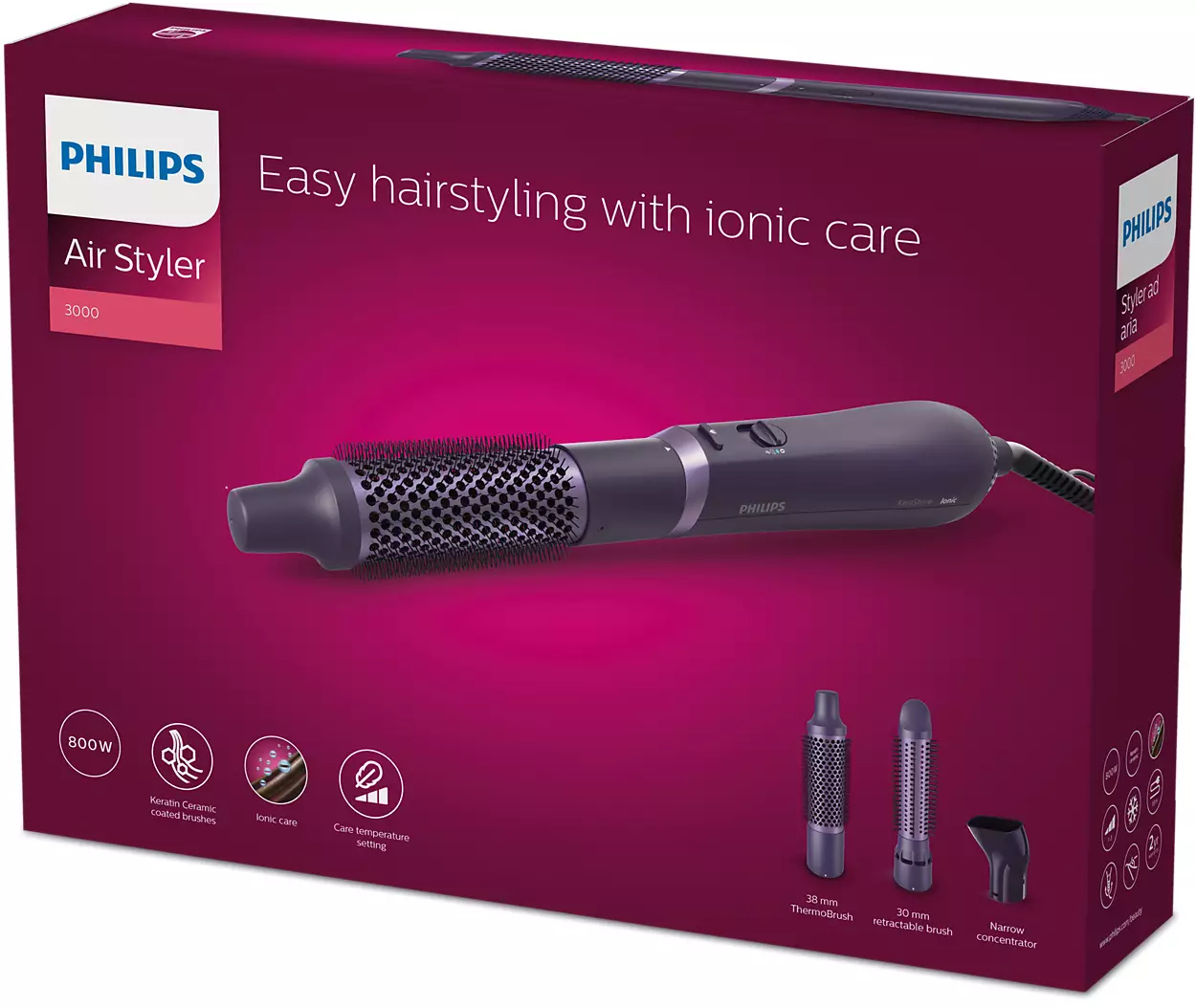 Ein Philips Haarstyler in einer Box. Er beinhaltet den Styler, zwei Aufsätze und die Produktbox, die Eigenschaften und Beschreibungen zeigt.