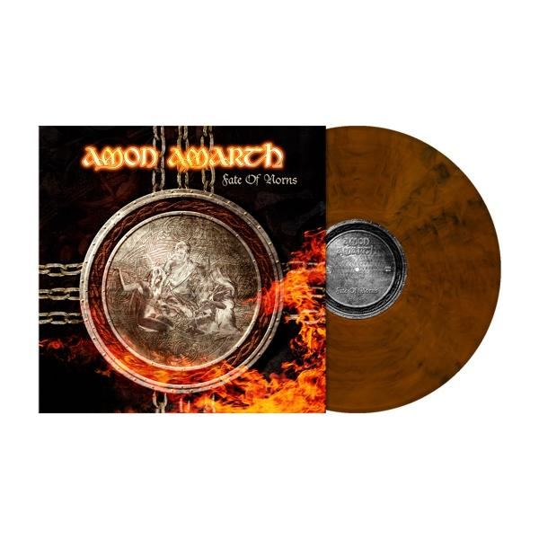Amon Amarth bakelit lemez, az album borítójával és egy barna koronggal. Tűz a háttérben.