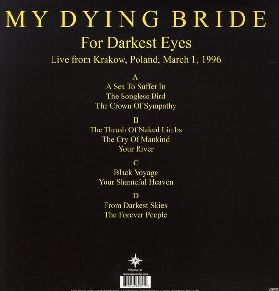 Fekete bakelit album dalszövegekkel és szöveggel fekete háttéren.