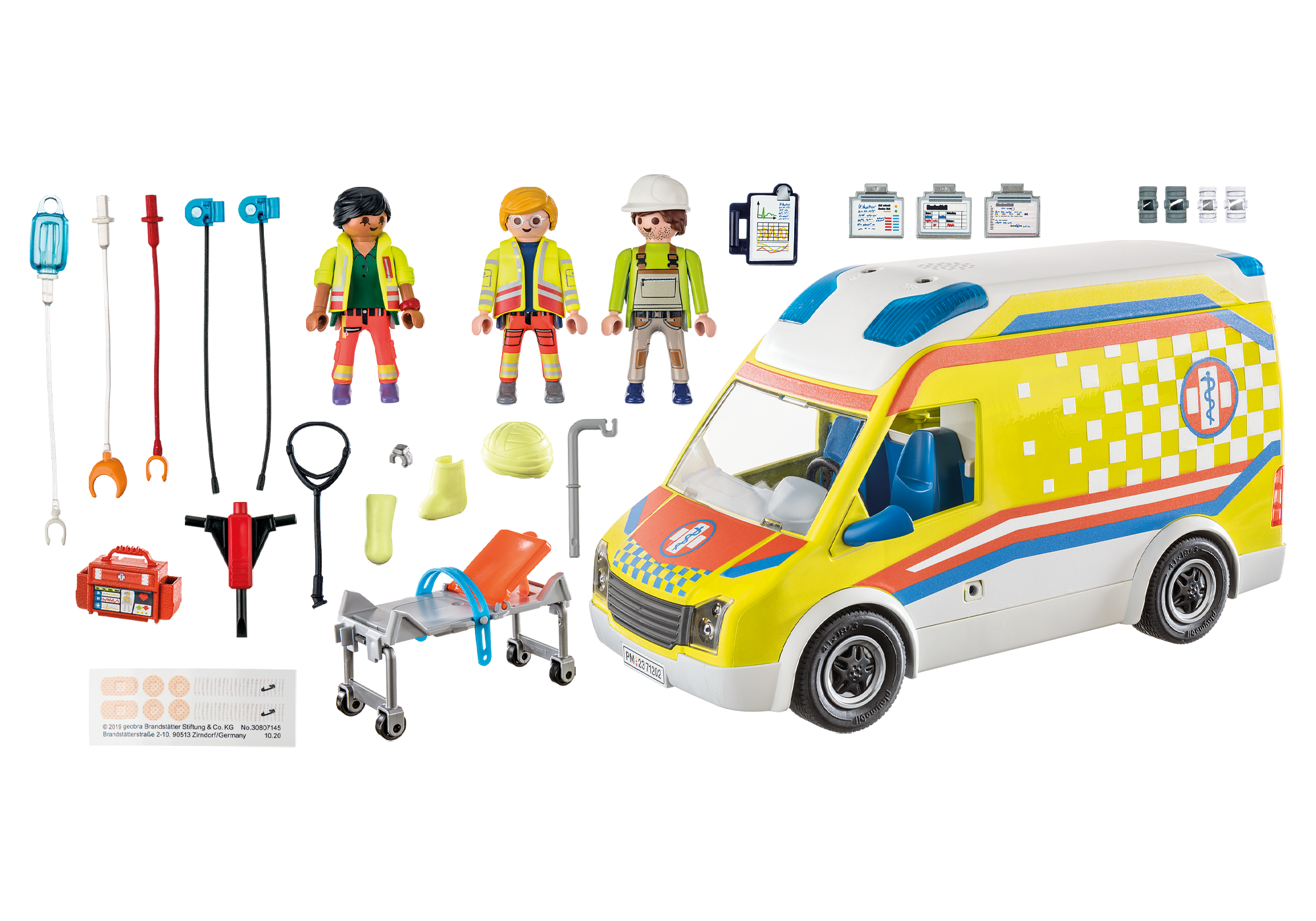 Eine Spielzeug-Ambulanz-Szene mit Figuren und medizinischer Ausrüstung.