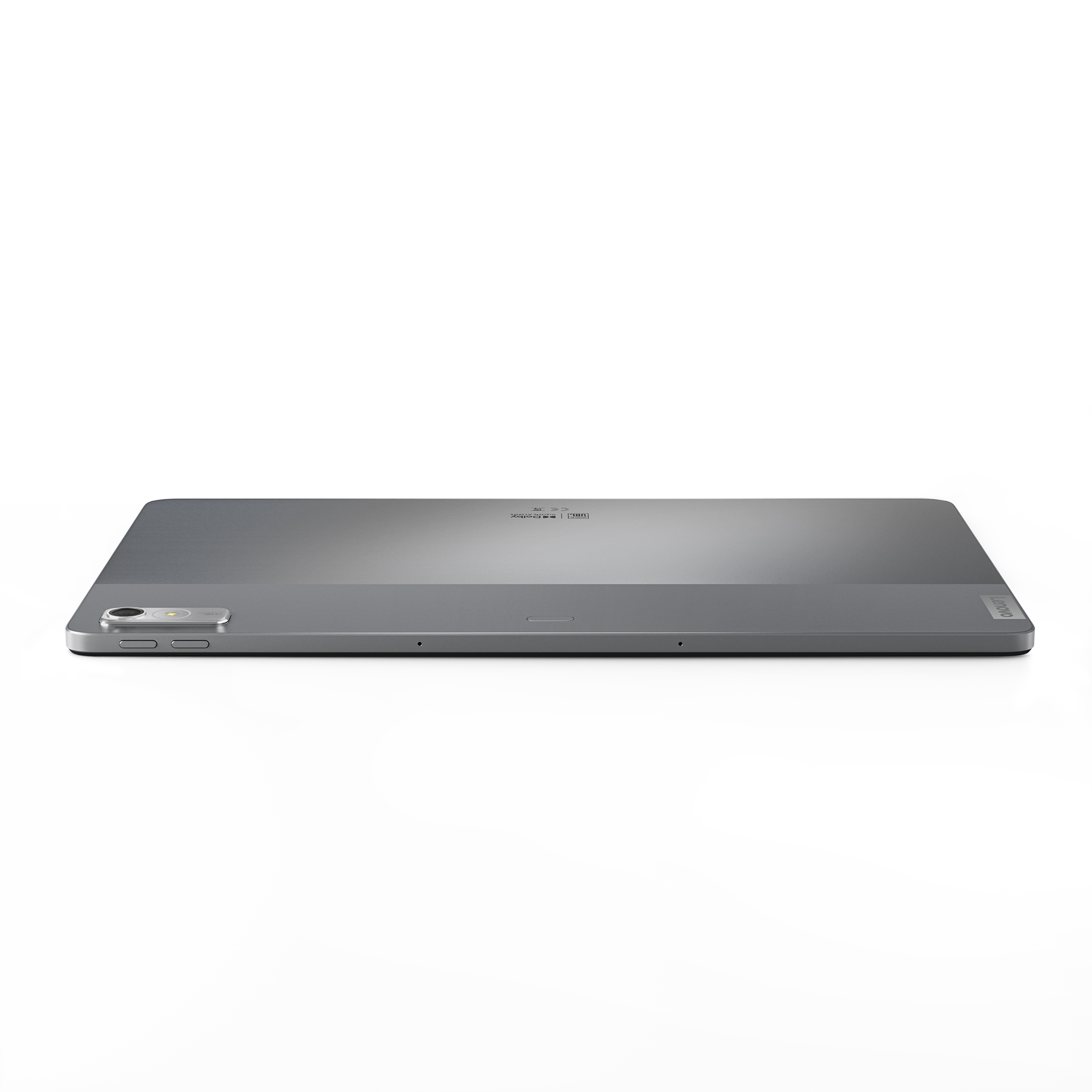 Silbernes Tablet auf schwarzem Hintergrund, von der Seite betrachtet. Ein schlankes und modernes Design.