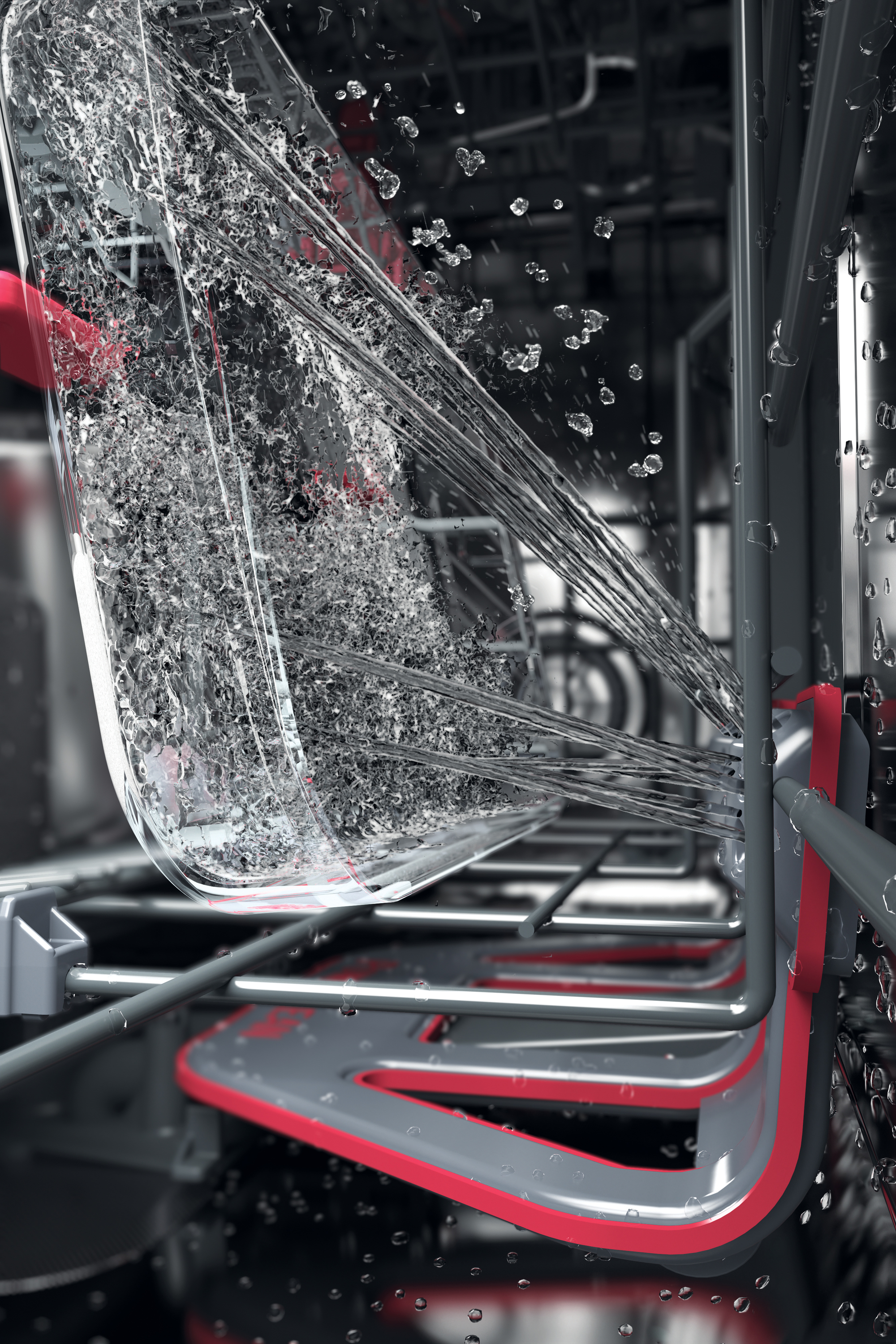 Glas wird in einer Spülmaschine mit Wasser besprüht. Der Sprühstrahl ist rot. Wassertropfen sind sichtbar.