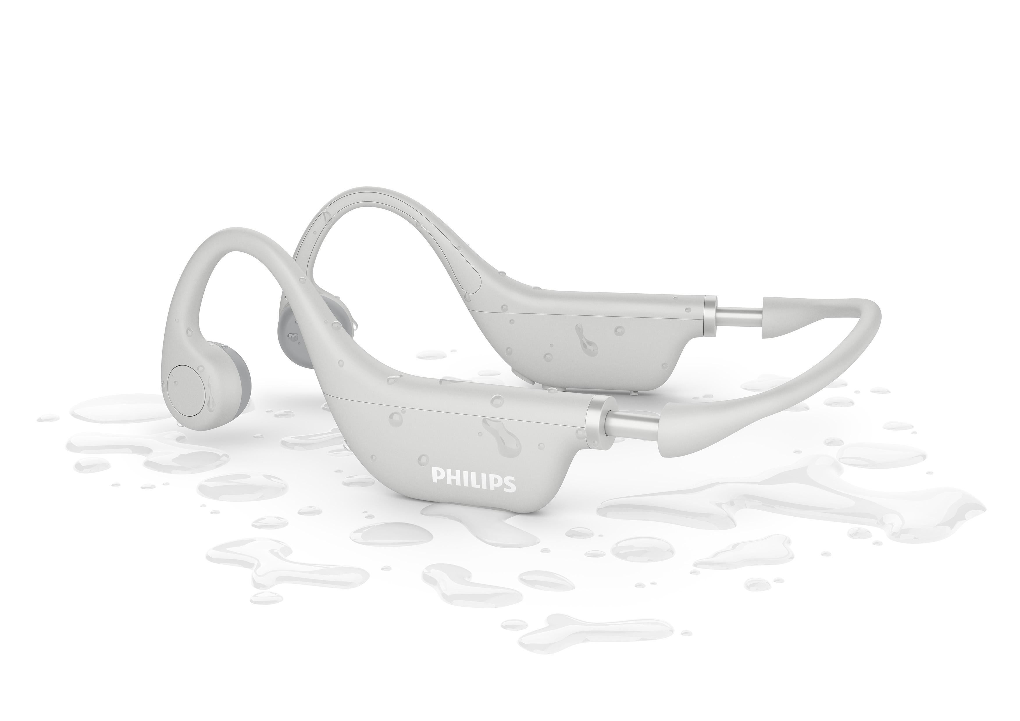 Paar Philips-Knochenschallkopfhörer im Wasser, weißer Hintergrund.