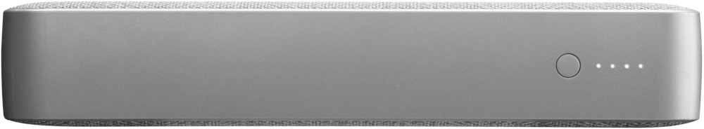 Un haut-parleur gris rectangulaire avec un bouton et trois petits points indiquant la durée de vie de la batterie. Le dessus est texturé.