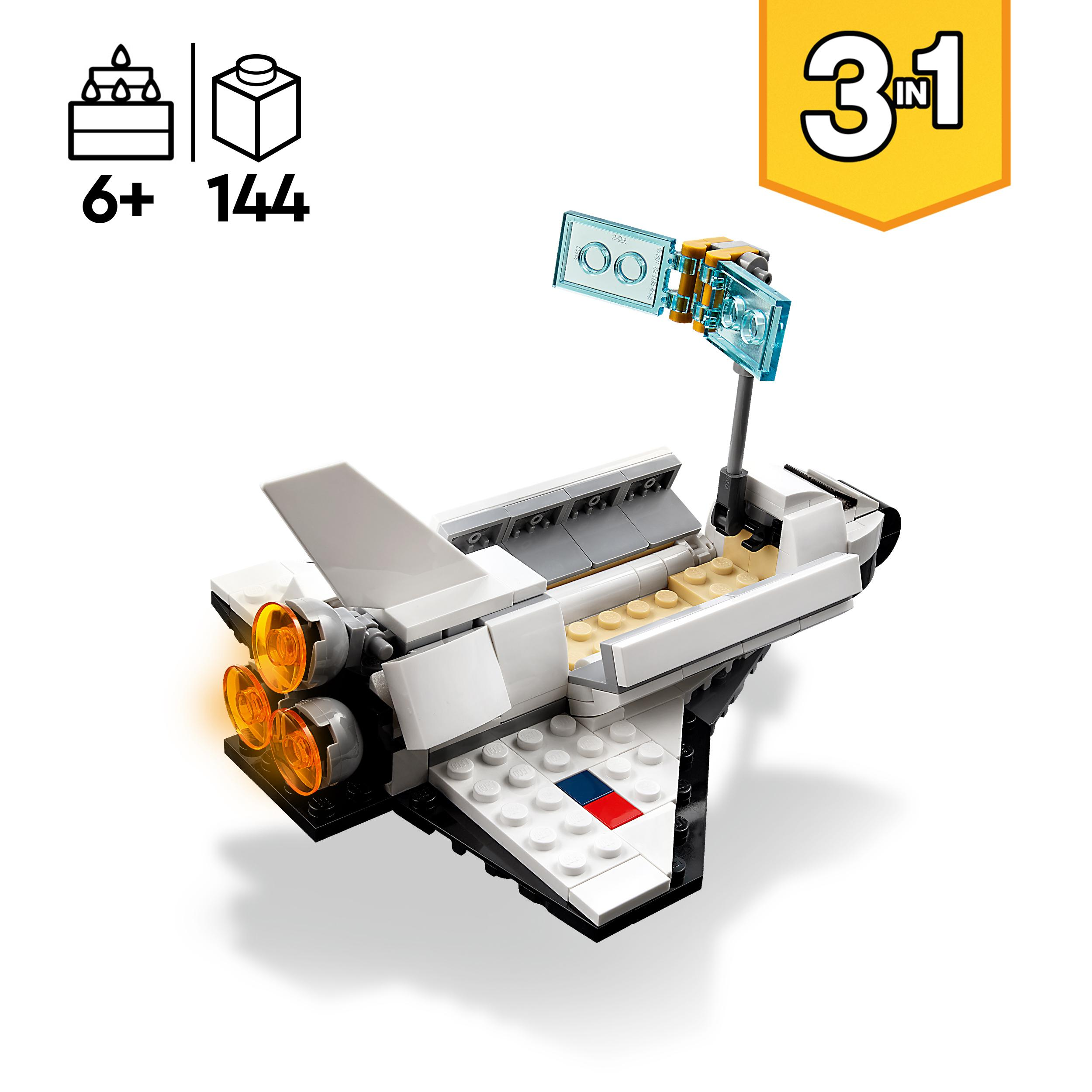 Ein weißes und graues Lego-Raumschiffmodell mit orangefarbenem Auspuff und einem blauen Panel.
