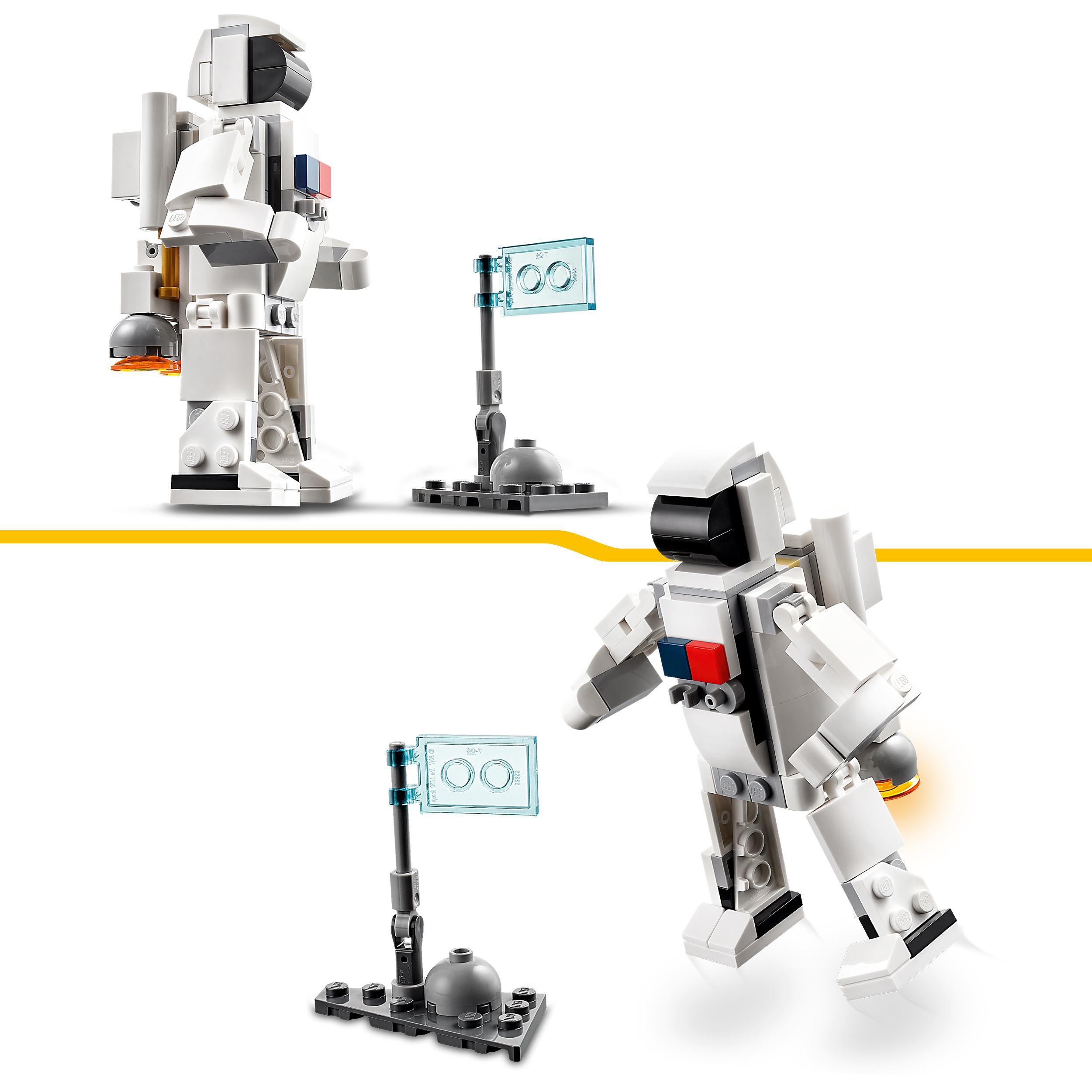 Zwei Lego-Astronautenfiguren mit einer Flagge und einem Sockel.