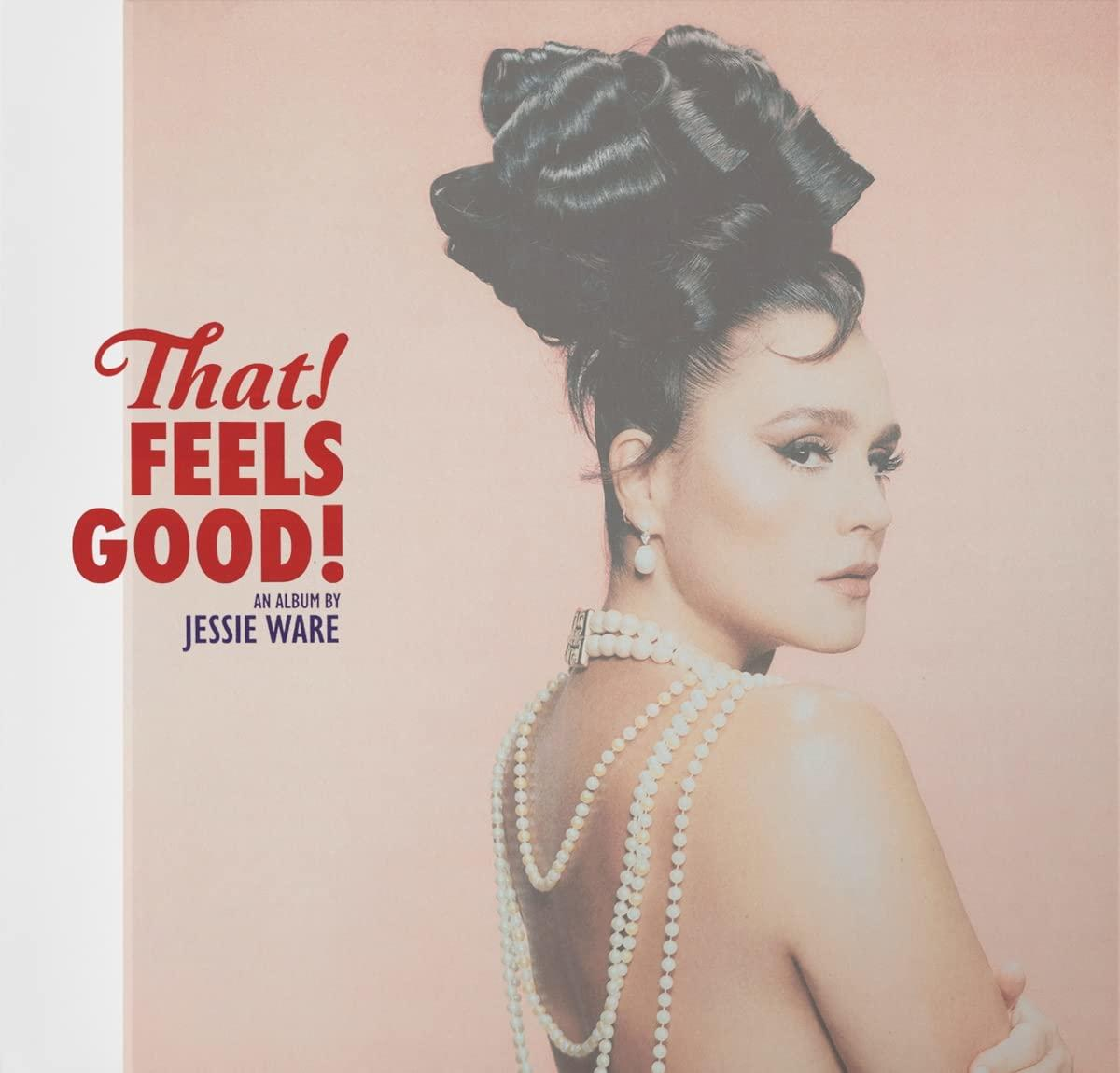 Pochette d'album avec une femme aux cheveux élégants, collier de perles et texte 'That! Feels Good!' de Jessie Ware.