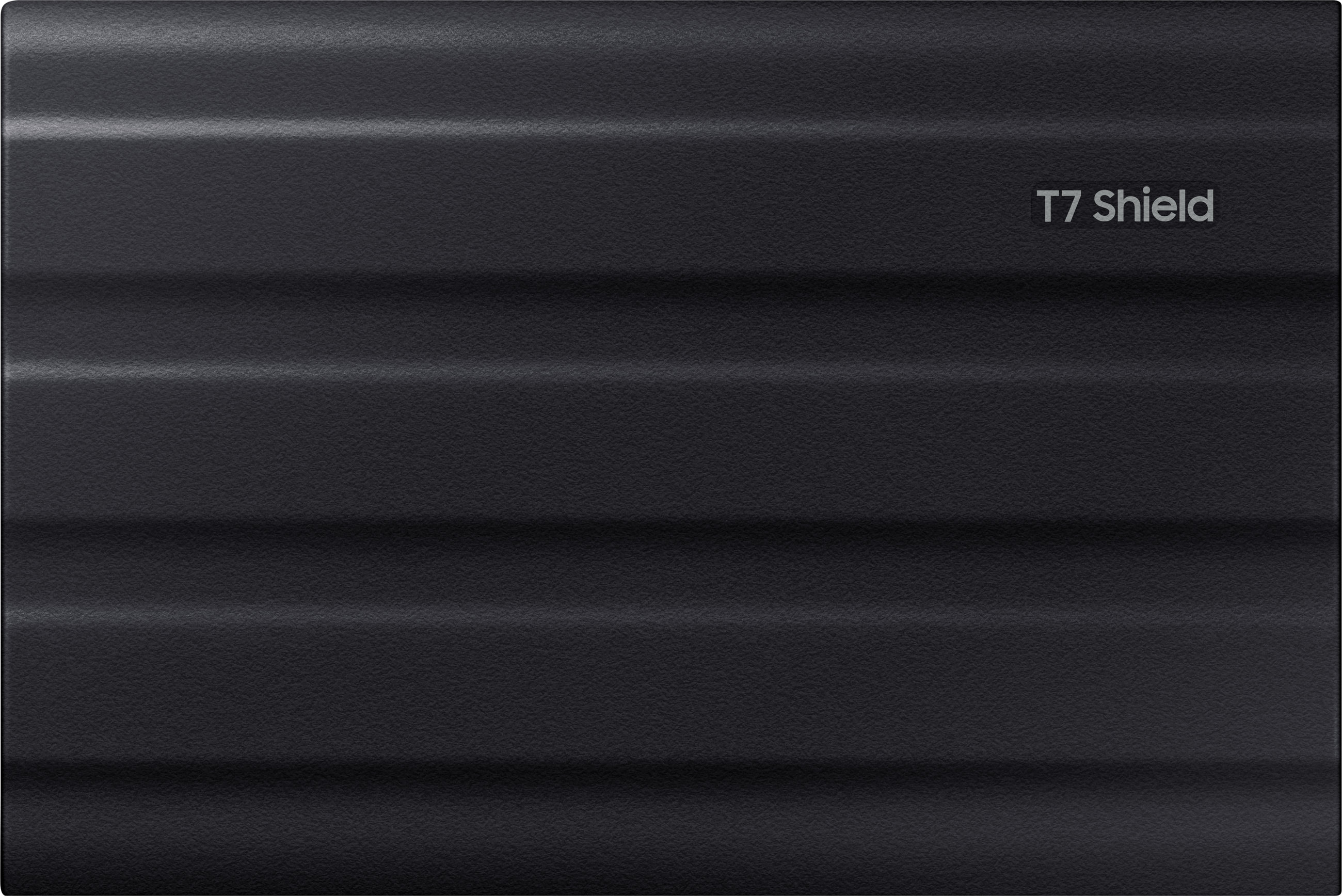 Un disque dur externe rectangulaire texturé gris foncé avec le texte 'T7 Shield'.