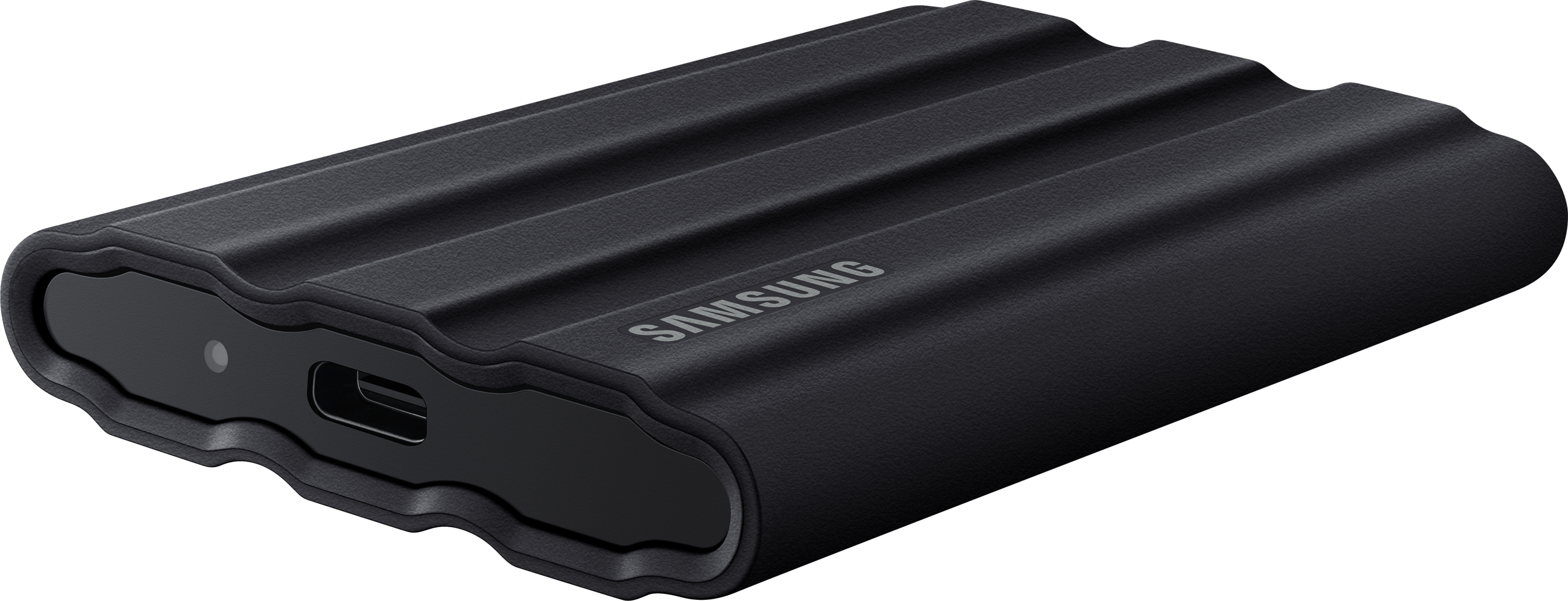 SSD portable noir et nervuré. Le logo Samsung est visible sur le côté. Il possède un port USB-C.