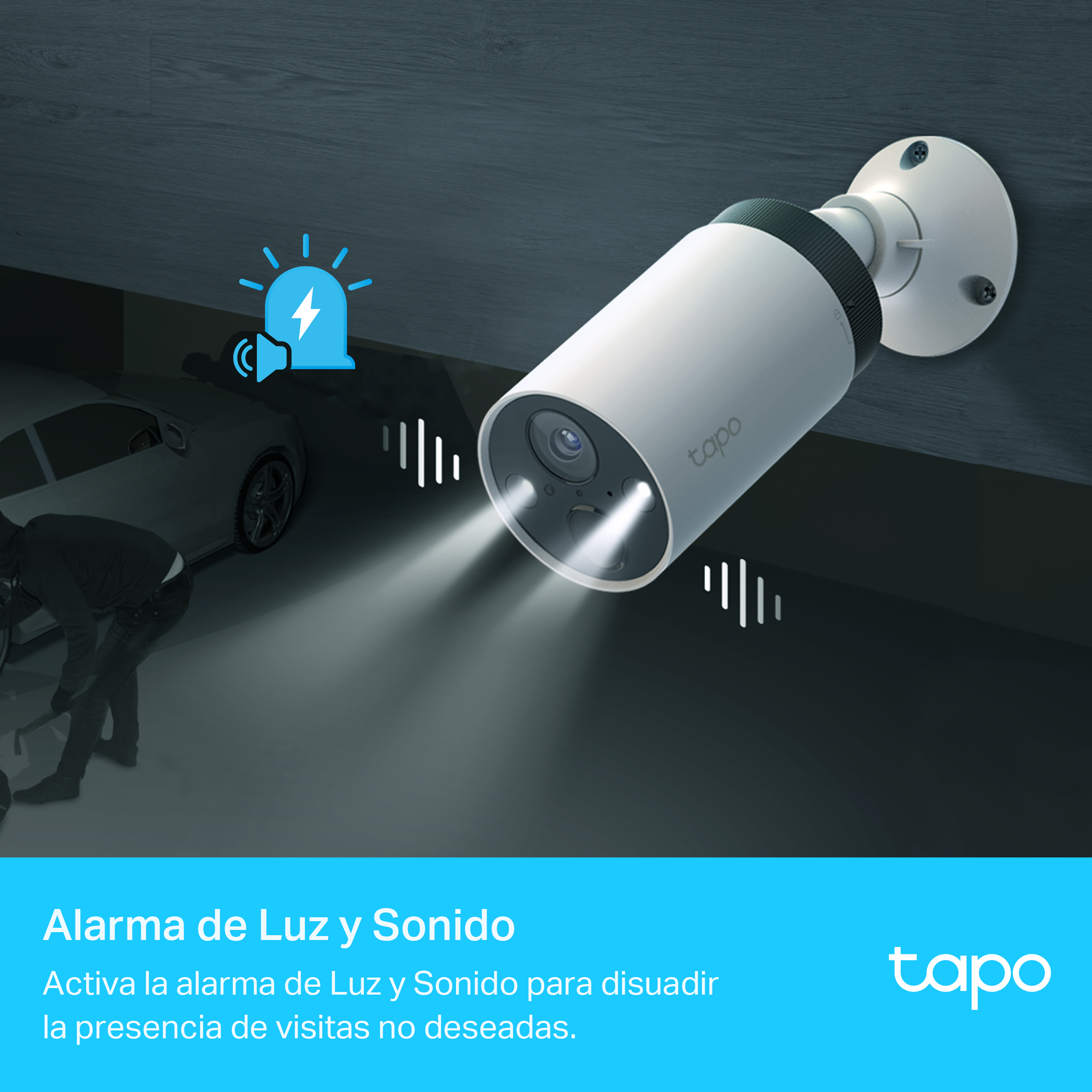 Cámara de seguridad blanca con luz y texto en una pared.