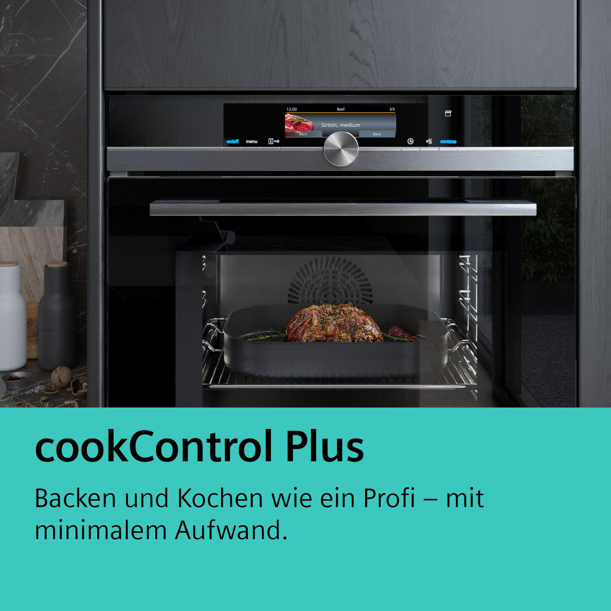 Ein Einbau-Backofen mit Digitalanzeige und Braten im Inneren.