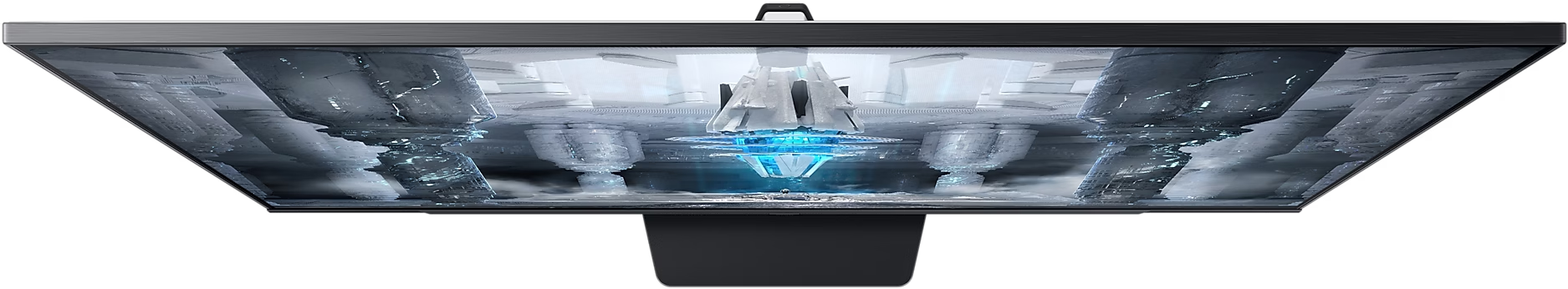 Eine Draufsicht auf einen Monitor. Der Bildschirm zeigt ein abstraktes, futuristisches Design.