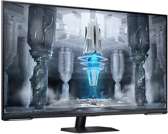 Ein großer Monitor zeigt eine futuristische Szene. Säulen und eine zentrale Struktur sind sichtbar.