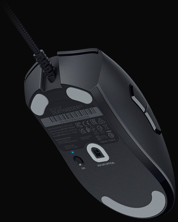 Black gaming mouse with details of the bottom.